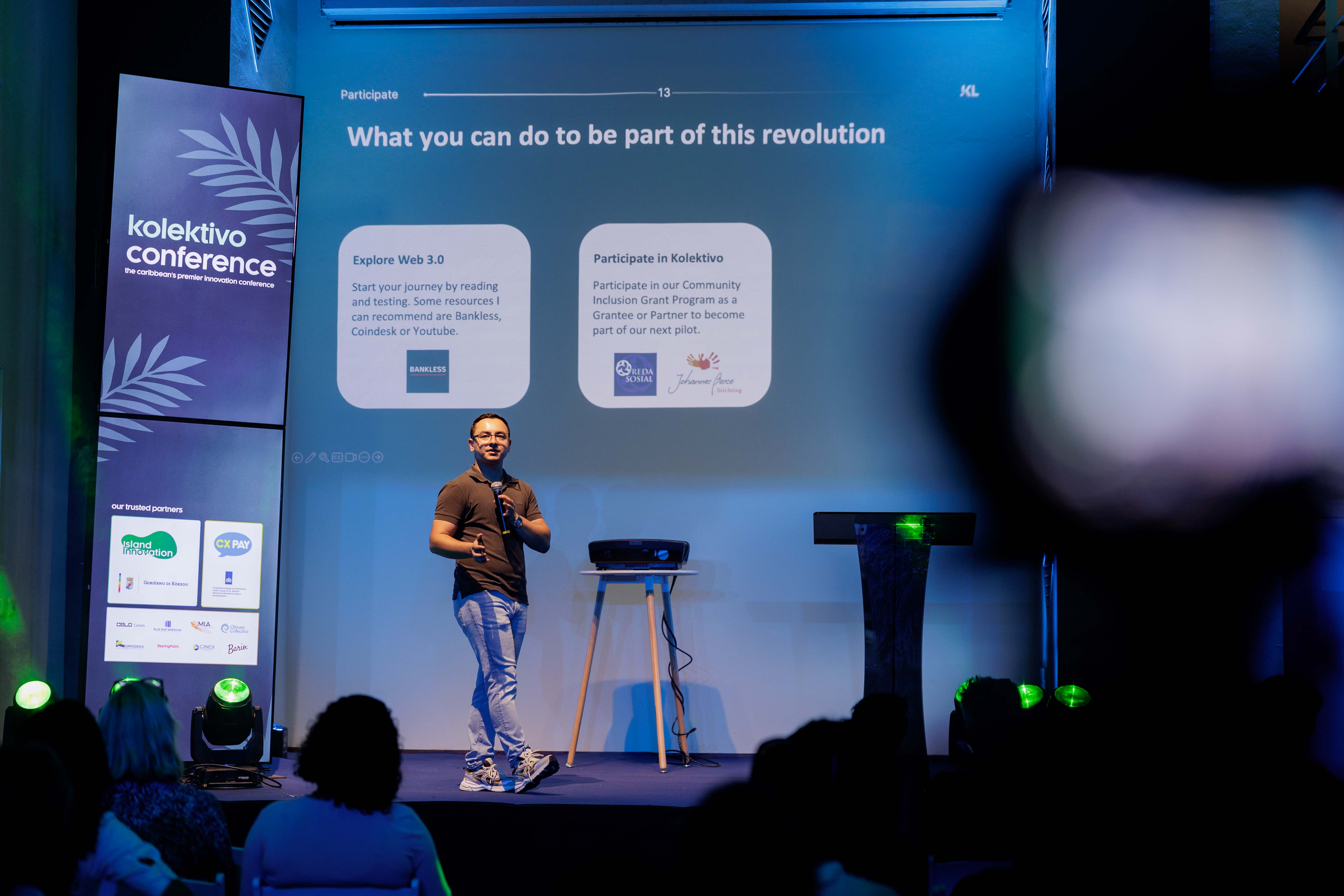 A speaker on stage at the Kolektivo Conference, the Caribbean's premier innovation conference